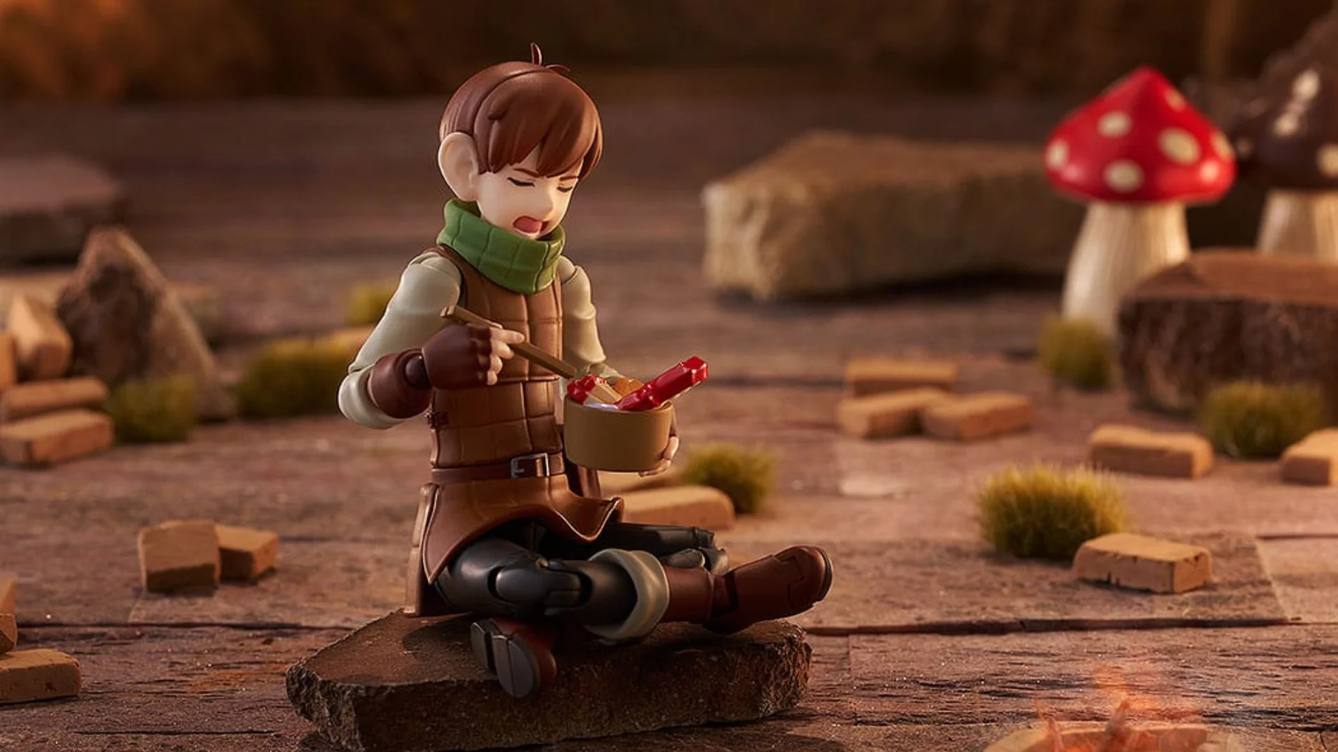 dungeon meshi action figure blog Delicious in Dungeon Chilchuck action figure sitting and eating dungeon food
