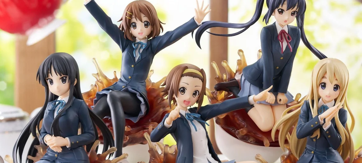 K-ON! Houkago Tea Time scale figures featuring Yui, Mio, Ritsu, Tsumugi, and Azusa with tea splash bases.