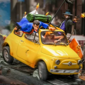Lupin the Third diorama statue featuring Lupin, Fujiko, and Jigen in a yellow Fiat 500 car chase