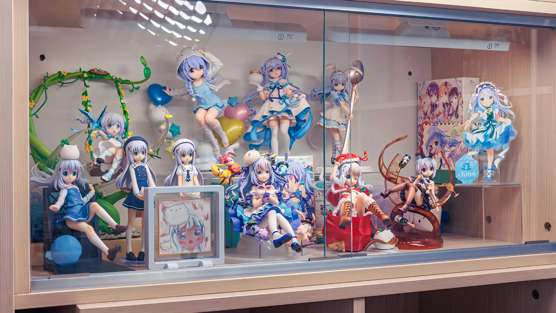 chino kafu anime figure collection display cabinet blog Glass display cabinet with LED lighting showcasing a Chino Kafū anime figure collection.
